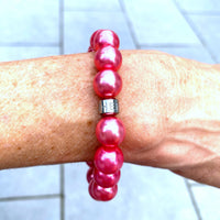 Herzlein® Perlenarmband "Fee". Allergiefreundliches Armbändchen mit 17 glänzenden Perlen in Pink