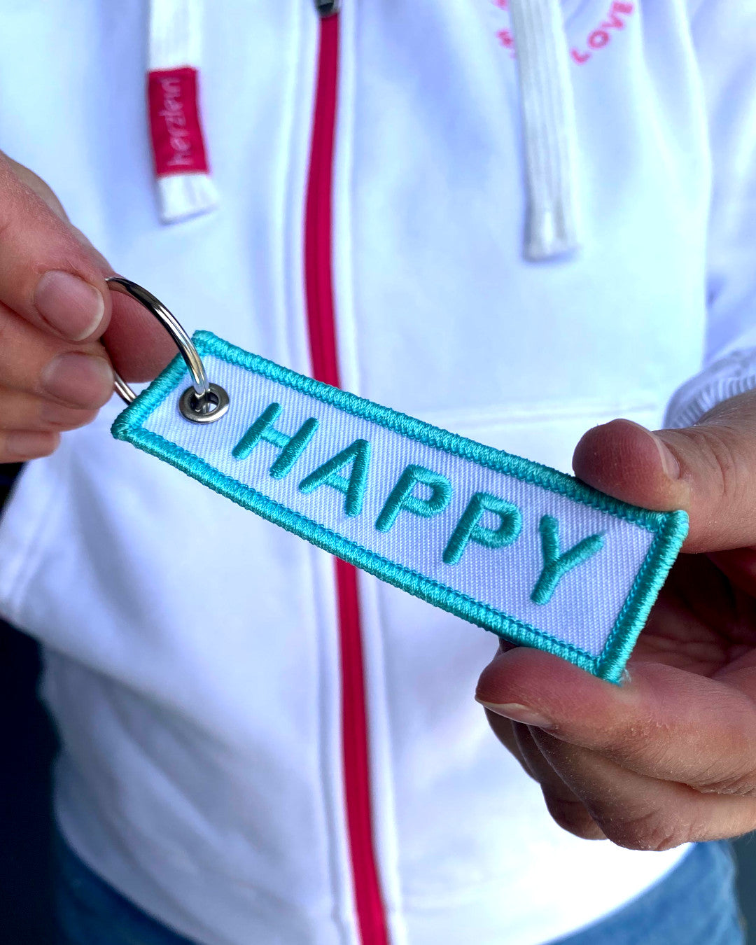 Herzlein® Schlüsselanhänger HAPPY in Weiß