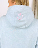 Herzlein® Kuschel Hoodie "Smiley" in meliertem Hellblau